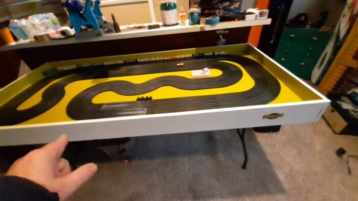 4 lane HO slot car racing track on a door ! Easy to build, transport and store